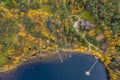 Drone view point of rural area in Autumn with lake Boroye, The big wooden house in forest, Piers on the lake, Valday Royalty Free Stock Photo