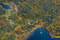 Drone view point of rural area in Autumn with lake Boroye, The big wooden house in forest, Piers on the lake, Valday Royalty Free Stock Photo