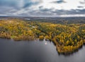 Drone view point of rural area in Autumn with lake Boroye, The big wooden house in forest, Piers on the lake, Valday Royalty Free Stock Photo