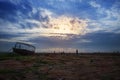 Big wooden ship on the beach dramatic cloudscape