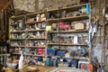 Big workshop wall of shelves filled with vintage tools