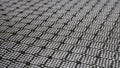 Diamond woven Black carbon fiber composite material background close up view Royalty Free Stock Photo