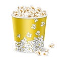 Big yellow bucket with popcorn. Royalty Free Stock Photo