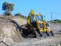 Big Yellow Digger Excavating New Dirt Road Royalty Free Stock Photo