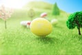 Big yellow easter egg on grass background in Dreamland or fairy world.. Royalty Free Stock Photo