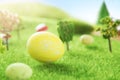 Big yellow easter egg on grass background in Dreamland or fairy world.. Royalty Free Stock Photo