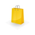 Big yellow paper colorful shopping or gifts bag isolated on white background Royalty Free Stock Photo