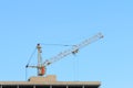 Big yellow stationary hoist on construction site Royalty Free Stock Photo