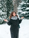 Big young girl enjoys the snow