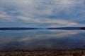 Looking across at the opposite shore of Lake Ainslie on a calm autumn day on Cape Breton Island Royalty Free Stock Photo