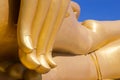 biggest golden buddha statue on blue sky background Royalty Free Stock Photo