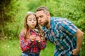 Biggest pollen allergy questions. Father little girl enjoy summertime. Dad and daughter blowing dandelion seeds. Keep Royalty Free Stock Photo
