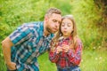 Biggest pollen allergy questions. Father little girl enjoy summertime. Dad and daughter blowing dandelion seeds. Keep Royalty Free Stock Photo