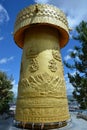 Biggest in the world golden tibetian prayer wheel in Shangri-la
