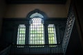 Beautiful Large multi paned window window and stairway in Independence Hall