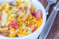 Bigos - stewed cabbage with carrots , smoked sausages and mushrooms, traditional dish of polish cuisine Royalty Free Stock Photo