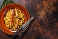 Bigos Stewed cabbage with mushrooms and meat sausages on a plate. Dark background. Top view. Copy space Royalty Free Stock Photo