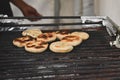 Bihari food litti being grilled