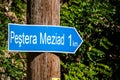 Signpost with the direction to Meziad cave
