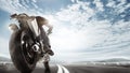 Biiker on highway, riding around a curve with a motion blur toned Royalty Free Stock Photo