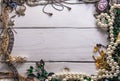 Bijouterie flat lay with mixed jewelry on rustic background