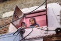 Children in window of house in old city Bundi. India Royalty Free Stock Photo