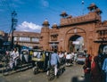 people pass the famous small city gate in the old town wall in Bikaner