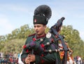 Indian military bagpipers band playing bagpipe during Camel festival in Rajasthan state, India