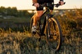 Bike adventure travel photo. Cyclist on the Beautiful Meadow Trail on sunny day. Royalty Free Stock Photo