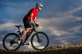 Bike adventure travel photo. Bike tourists ride on the countryside downhill. Royalty Free Stock Photo