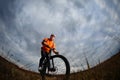 Bike adventure travel photo. Bike tourists ride on the countryside downhill. Royalty Free Stock Photo