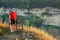 Bike adventure travel photo. Cyclist on the Beautiful Meadow Trail on sunny day. Royalty Free Stock Photo