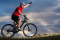 Bike adventure travel photo. Bike tourists ride on the countryside downhill. Royalty Free Stock Photo