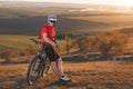 Bike adventure travel photo. Bike tourists ride on the countryside downhill. Royalty Free Stock Photo