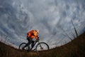 Bike adventure travel photo. Bike tourists ride on the countryside downhill. Royalty Free Stock Photo