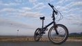 Bike in the beach with cloudy background