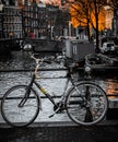 Bike on a bridge against the Prince Canal in Amsterdam in the Netherlands, winter