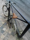 Bike chained with a lock, stolen wheel Royalty Free Stock Photo