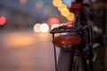 Bike in the city, dusk: Rear picture of a city bike, blurred background