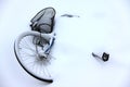 A bike covered of snow.