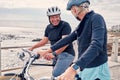 Bike, cycling and beach with a senior couple riding outdoor on the promenade during summer for exercise. Bicycle Royalty Free Stock Photo