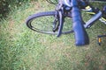 Bike detail and green grass Royalty Free Stock Photo