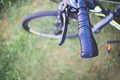 Bike detail and green grass Royalty Free Stock Photo