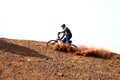 Bike Downhill on red hill Royalty Free Stock Photo
