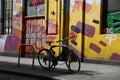 bike in dublin in front of a coloured wall