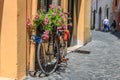 Bike with flowers on the street in Rome Royalty Free Stock Photo