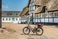 A bike in front of an idyllic half-timbered tavern in Denmark