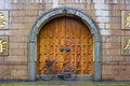Bike in front of temple door Royalty Free Stock Photo