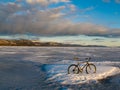 Bike on frozen Lake Laberge, Yukon, Canada Royalty Free Stock Photo