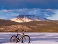 Bike on frozen Lake Laberge, Yukon, Canada Royalty Free Stock Photo